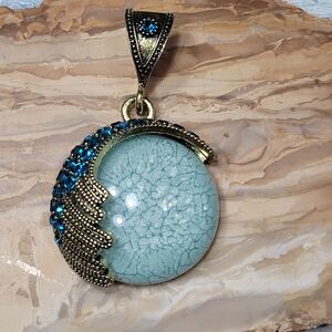 Elegant Blue and Gold Pendant.